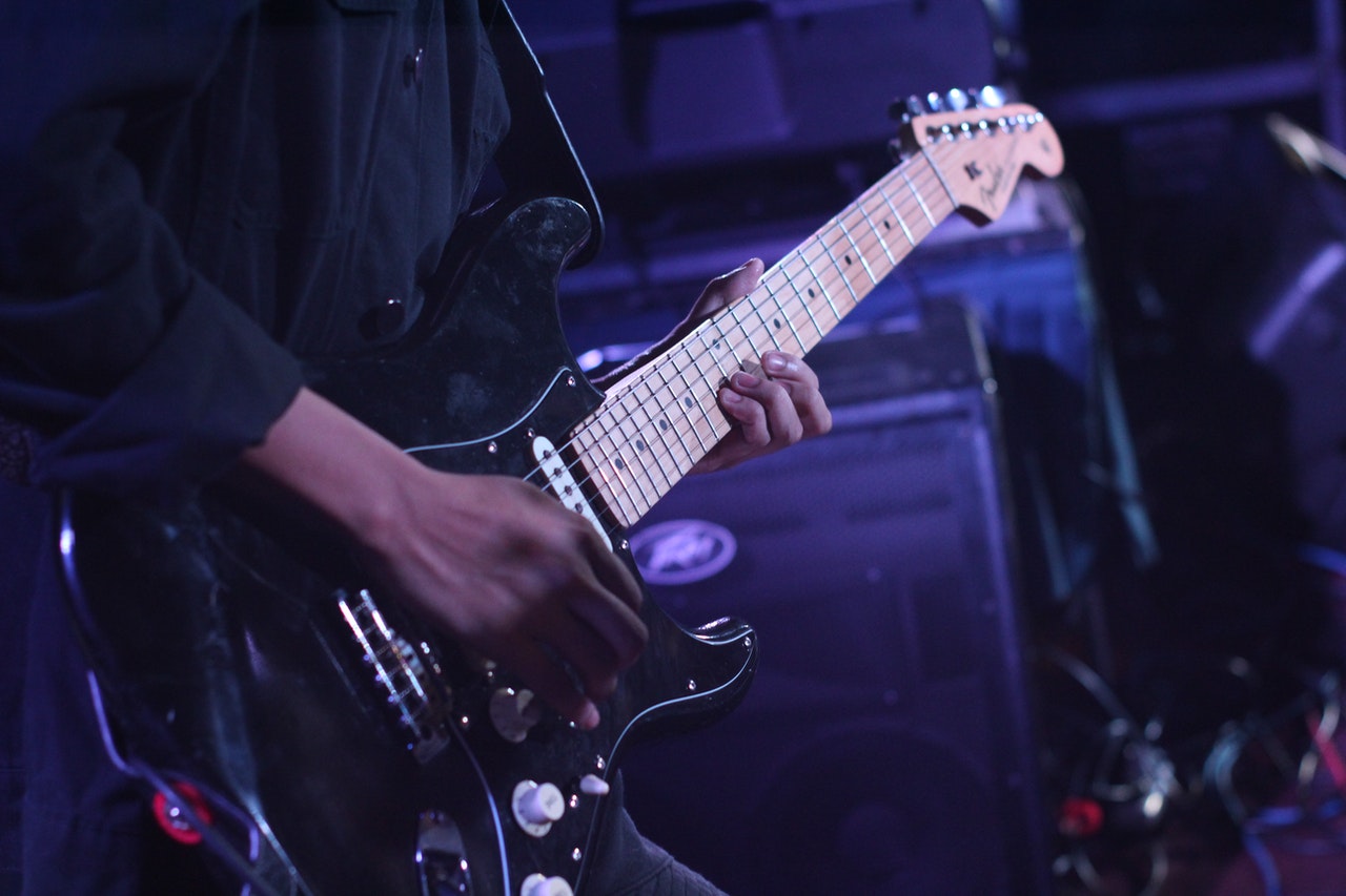 how to improve stage presence as a guitarist